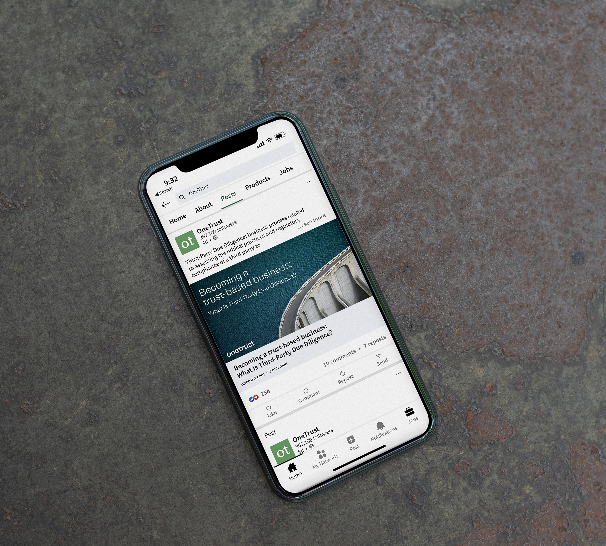 Mobile phone displaying LinkedIn search results for OneTrust